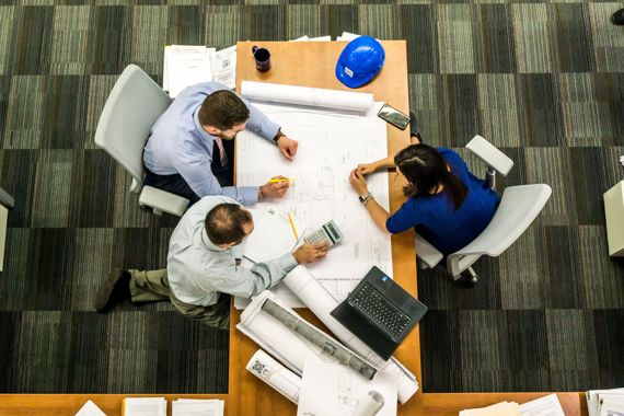 client with project managers from above